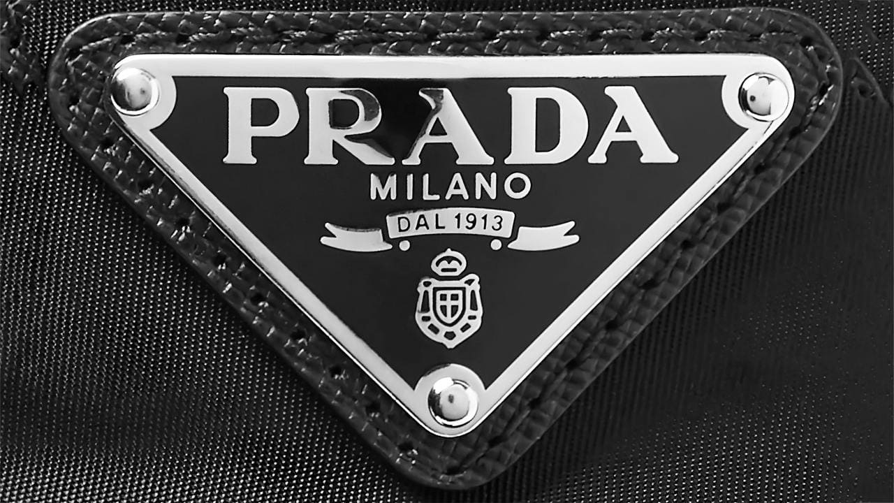 Prada’s signature triangular logo plaque