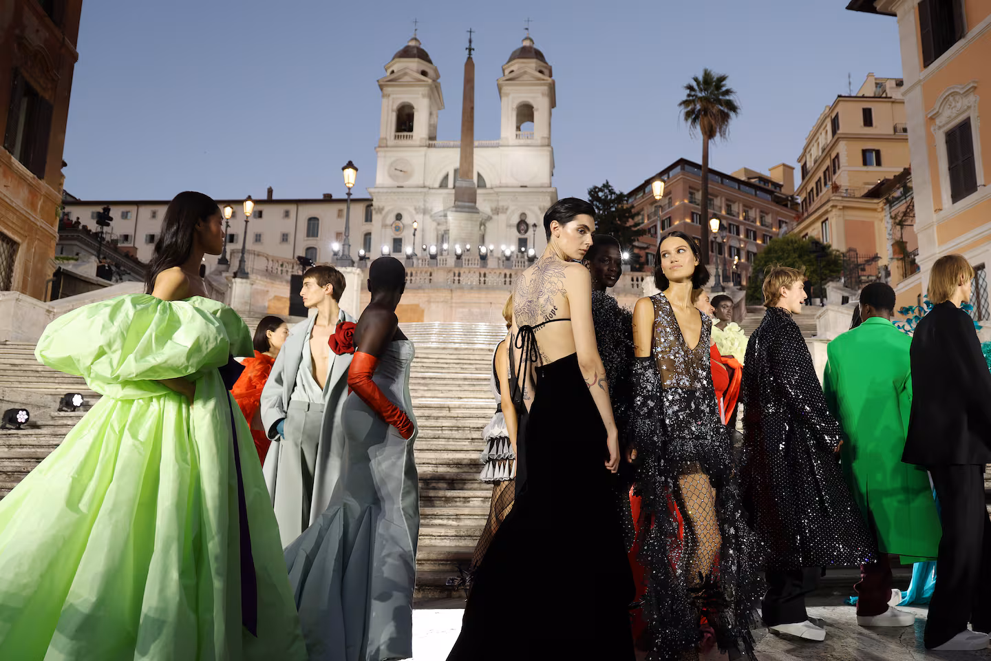 Models pose on the runway at the Valentino Haute Couture Fall/Winter 2022 show