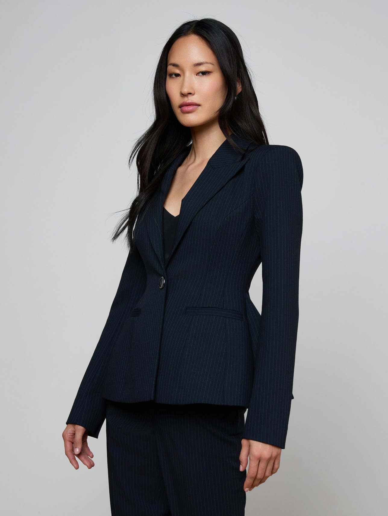  The L'Agence Therese Blazer showcasing a sleek, figure-contoured silhouette.