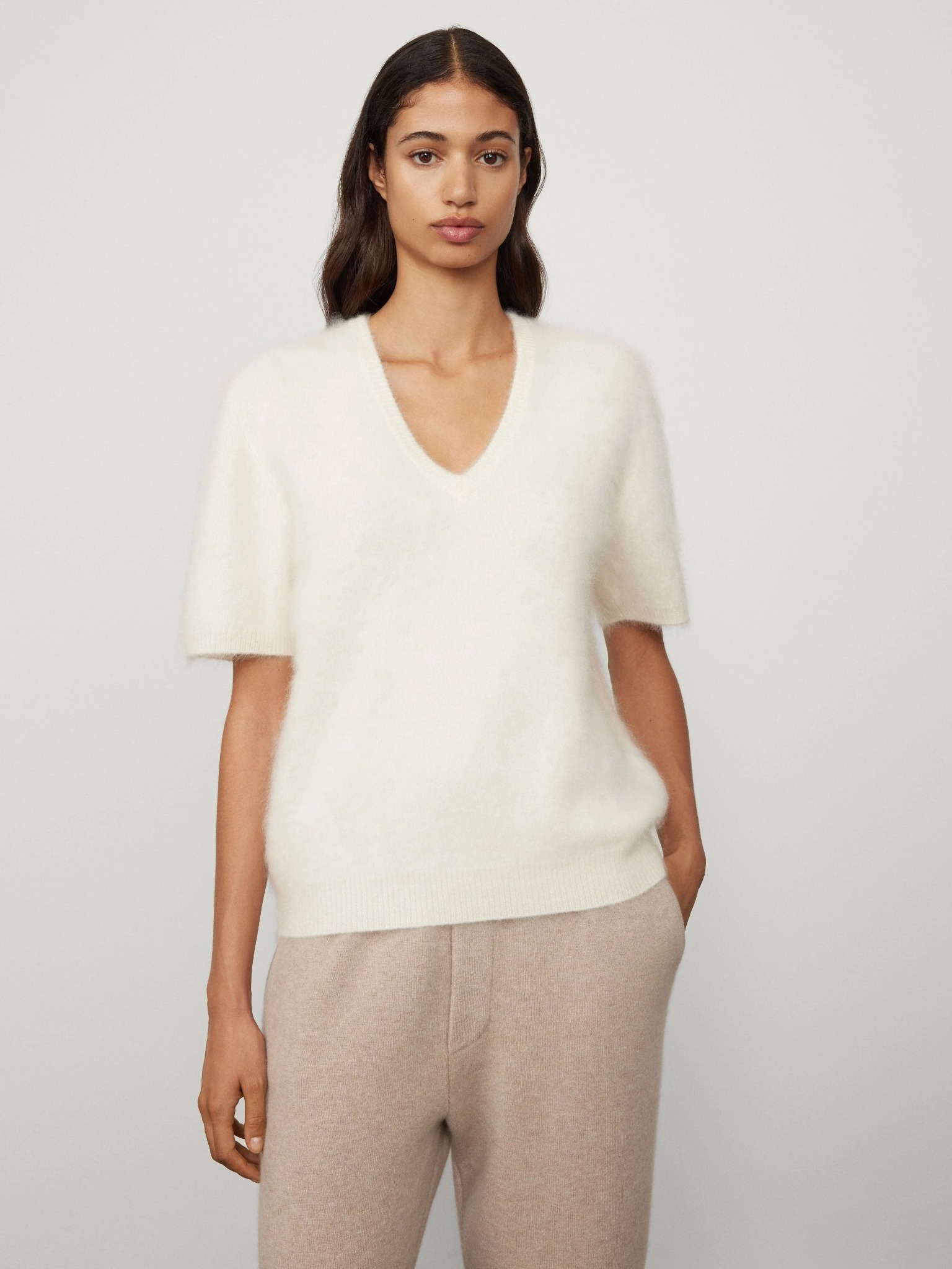 The relaxed Lisa Yang Lovisa cashmere T-shirt styled casually with matching cashmere knit trousers.
