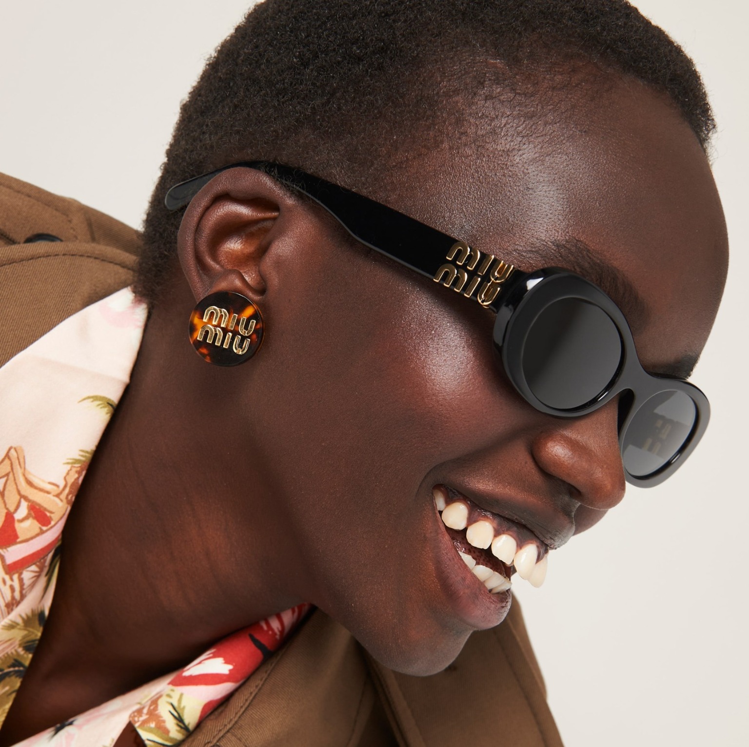 Miu Miu MU 06ZS sunglasses in black