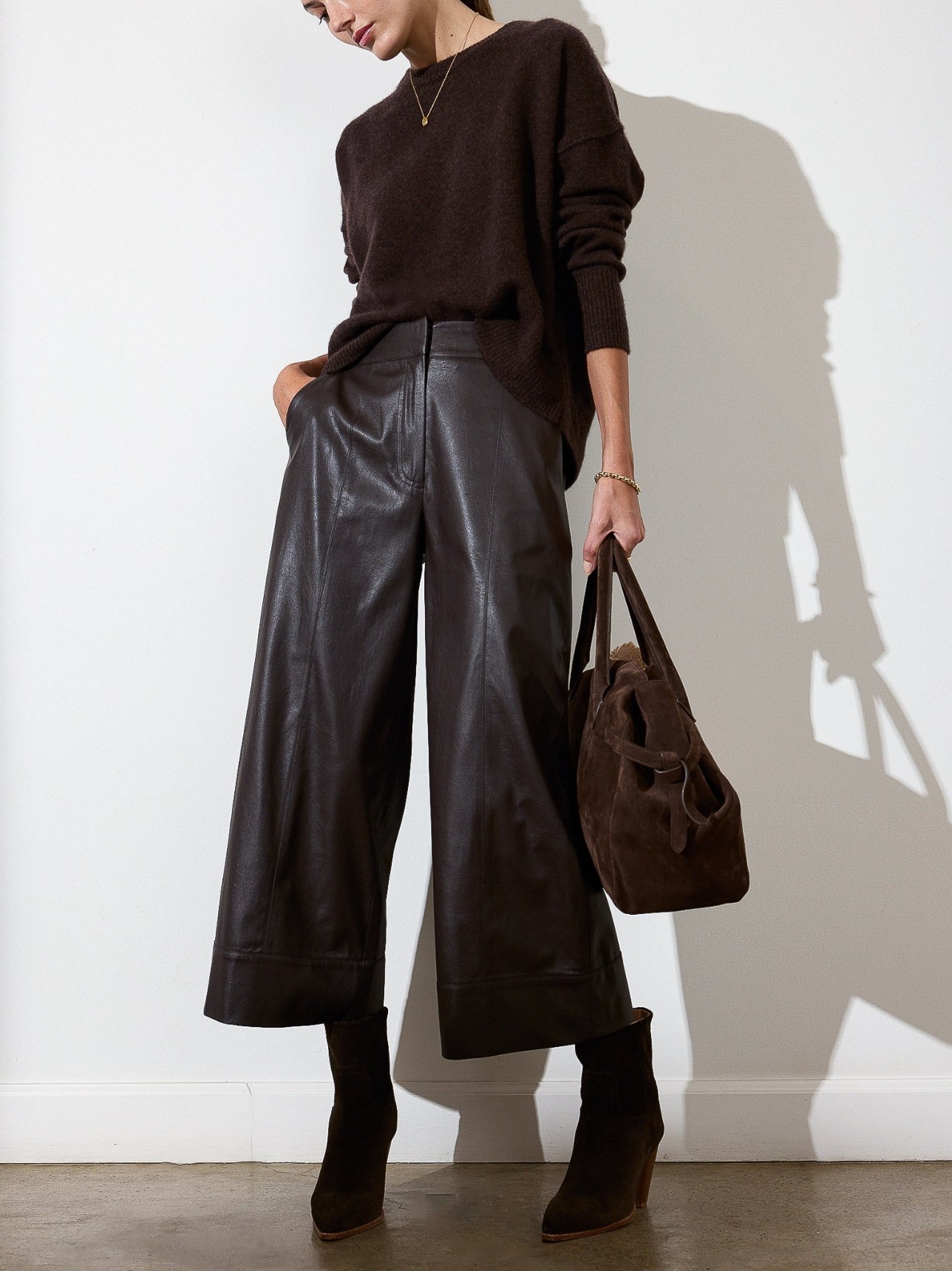 Brochu Walker's Odele Cropped Pant in black vegan leather featuring wide legs and deep-stitch cuffs.