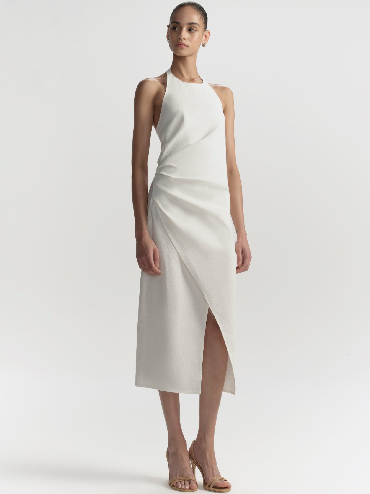 The A.L.C. Sylvie Halter Dress styled with minimalist heels for an evening event.