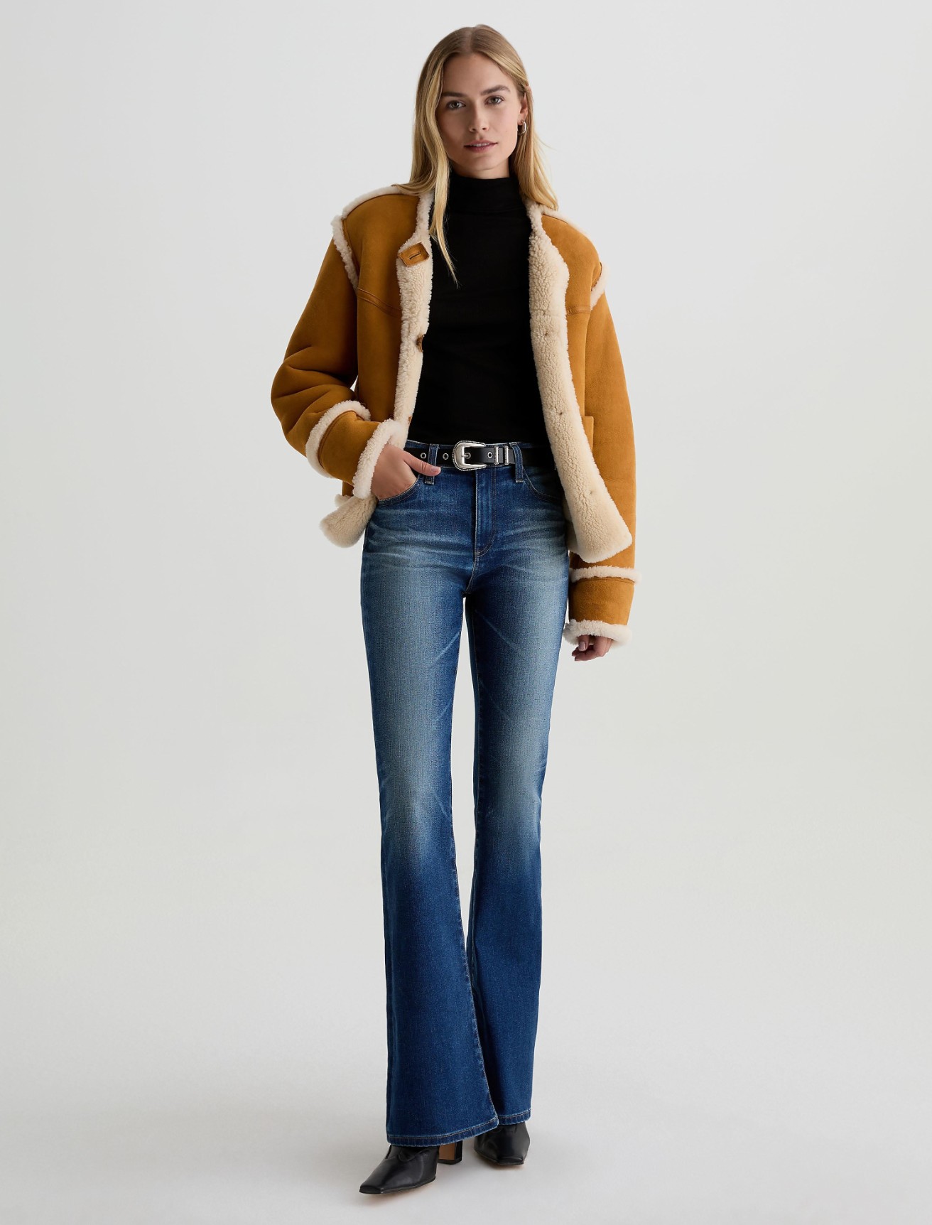 The AG Jeans Farrah Bootcut Jean in a dark indigo wash.