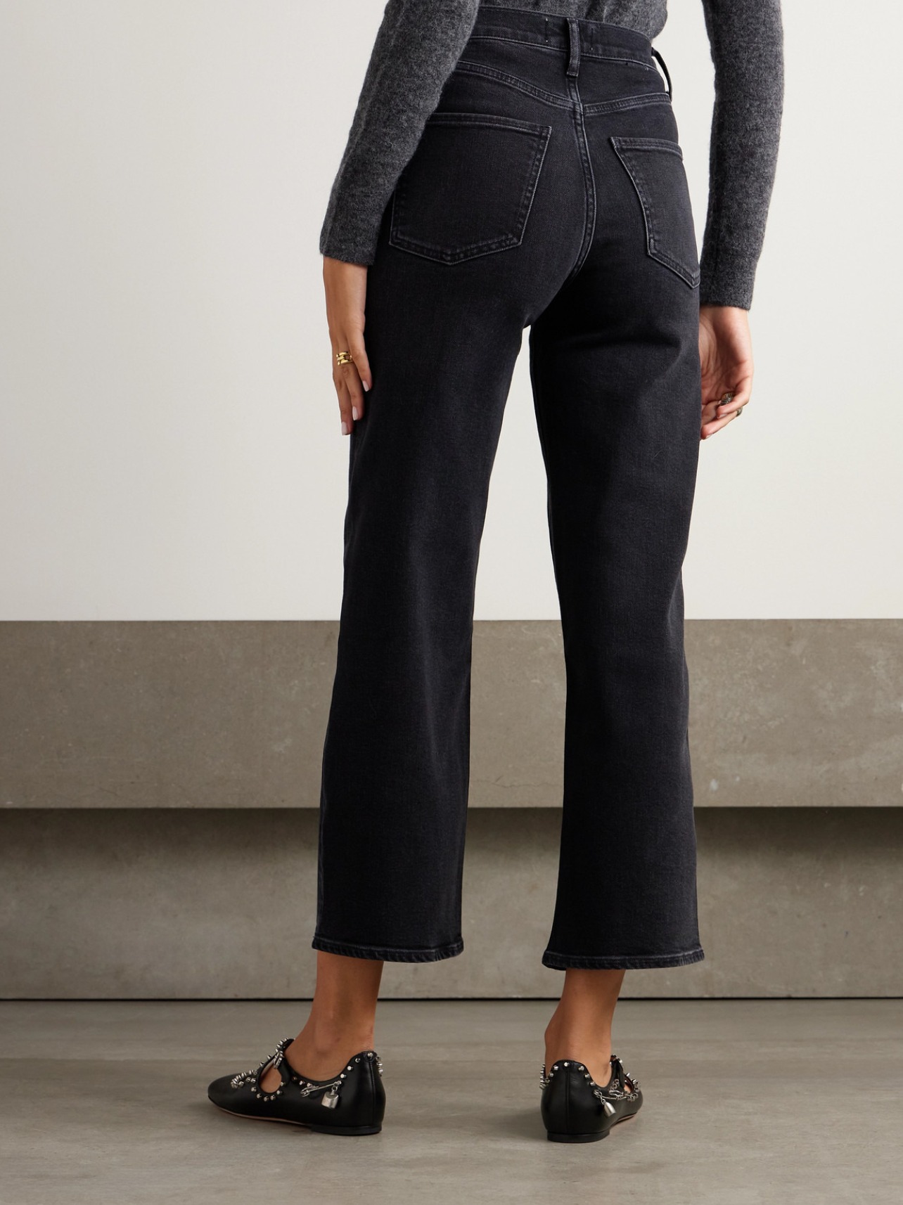 Rear detail view showing the back side pockets and stitching of AGOLDE Ren High-Rise Wide-Leg Jeans.